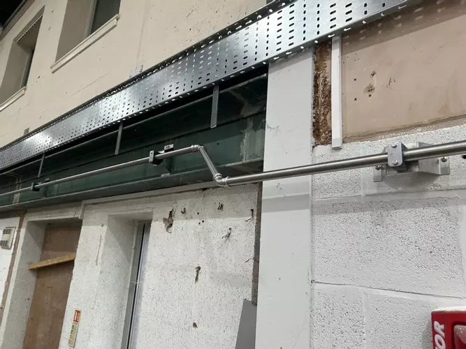 ow-pressure pipework installed as part of the new pressure washing infrastructure. This feed supplies water to the pressure washer systems and forms part of the wider distribution network installed throughout the facility. Routed alongside the high-pressu